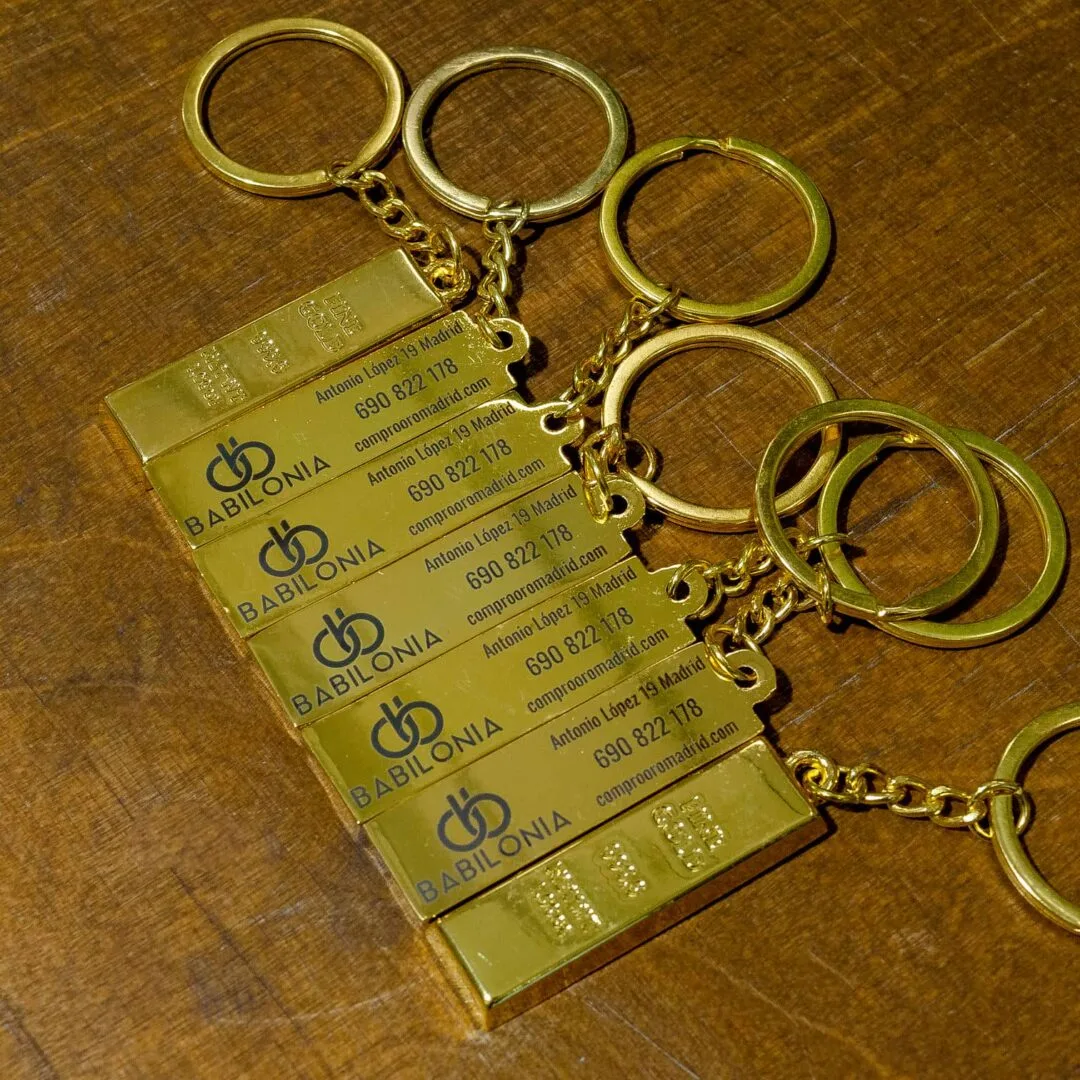 Grabado de llaveros metálicos para BABILONIA