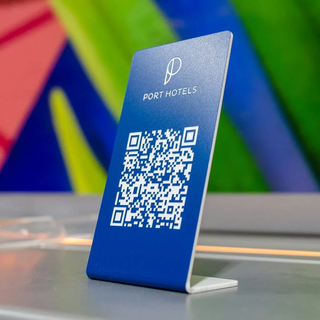 Chapas con QR para cadena PORT HOTELS